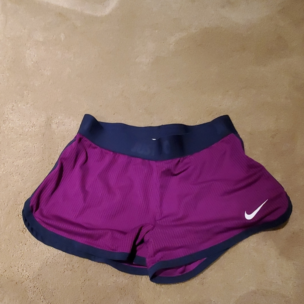 Purple shorts with navy blue trim running shorts